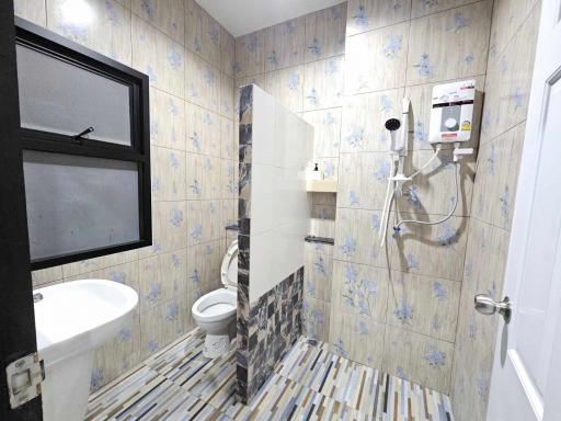 Compact modern bathroom with tiled walls and flooring