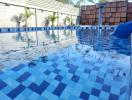 Residential swimming pool with blue tiles and festive decorations