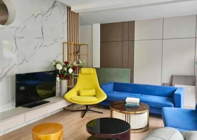 Modern living room interior with vibrant furniture and elegant design
