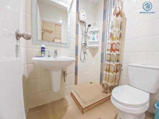 Compact bathroom with modern amenities