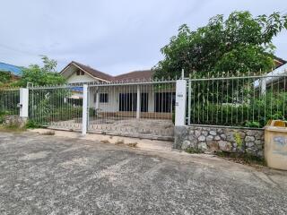 2 semi detached bungalows or 1 big family home