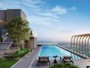 Luxurious rooftop swimming pool with city skyline view at dusk