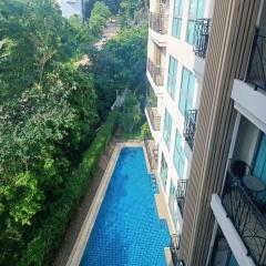2 bedroom corner condo with a pool view