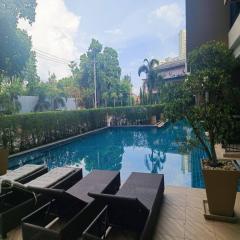 2 bedroom corner condo with a pool view