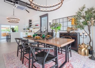 Elegant dining room with contemporary lighting and stylish decor