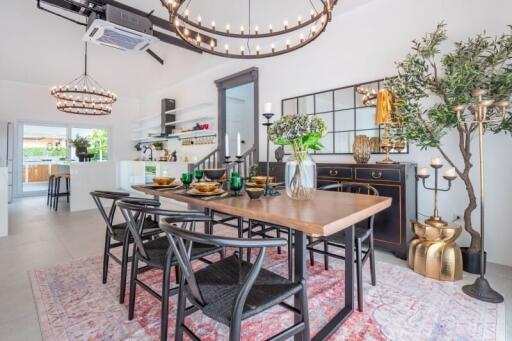 Elegant dining room with contemporary lighting and stylish decor