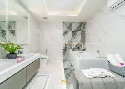 Modern bathroom with marble finishes and luxurious detailing