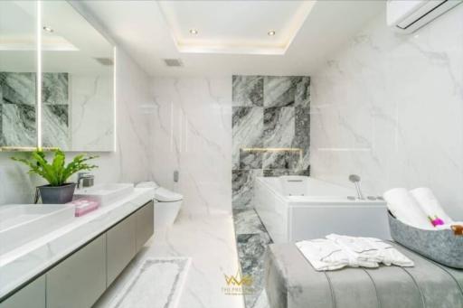 Modern bathroom with marble finishes and luxurious detailing