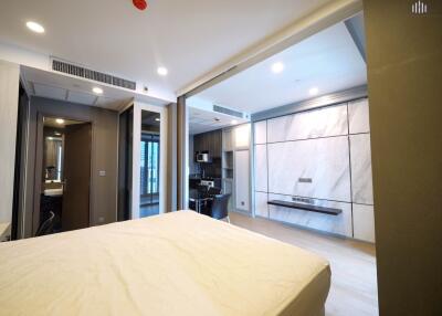 Modern and spacious bedroom with attached bathroom and kitchenette