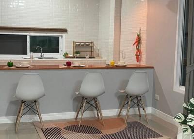 Modern kitchen with bar seating area