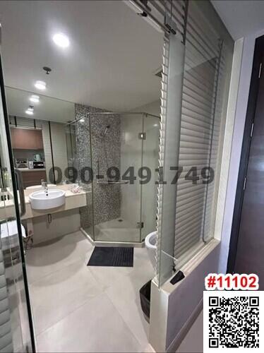 Modern bathroom with shower and vanity