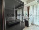 Spacious bedroom with large wardrobe and abundant natural light