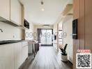 Modern kitchen with wooden cabinets and grey flooring in a well-lit apartment