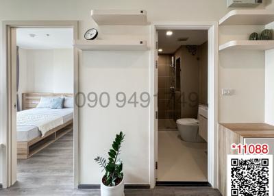 Modern apartment interior with view into bedroom and bathroom