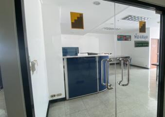 Office lobby entrance with reception desk