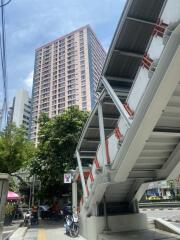 High-rise apartment building viewed from street level