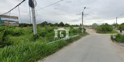 42220 - Empty land for sale, area 14 rai, next to the road on 2 sides, near Map Pong intersection, Phan Thong, Chonburi.