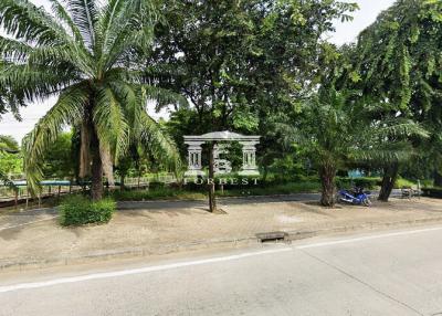 42559 - Land for long-term rental, area 3-3-21.5 rai, next to the main road, along Pradit Manutham Expressway.