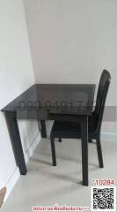 Compact dining table with a single chair in a minimalistic setting