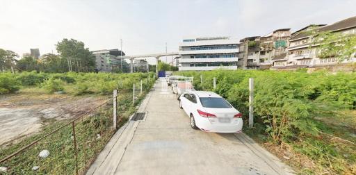 34654 - Land next to the BTS station, Lat Phrao Road 69, area 3 rai 129 sq m, can be built high (city plan 63)
