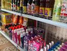 Shelves stocked with various household goods and groceries