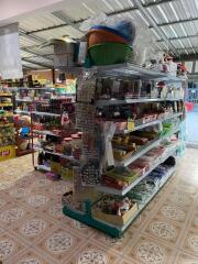Spacious store interior with various products on shelves