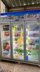 Fully stocked beverage cooler in a retail shop