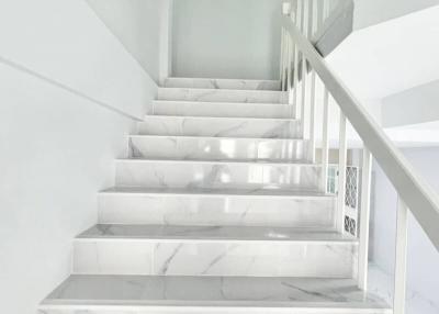 Minimalist white marble staircase with sleek design