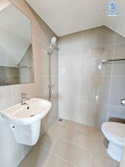 Modern bathroom with white fixtures