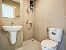 Modern bathroom with sleek fixtures and tiled walls