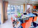 Spacious dining room with natural lighting and modern decor