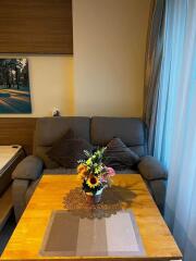 Cozy living room with sofa and wooden table