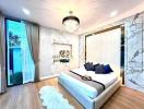 Modern bedroom with elegant decor, marble walls, and ample lighting