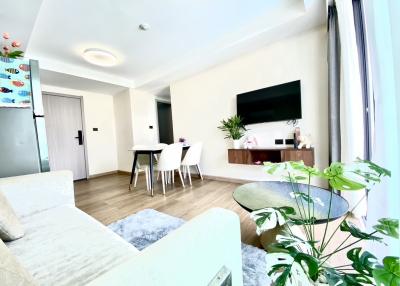 Spacious and modern living room with dining area