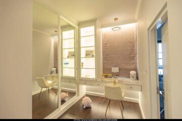 Cozy bedroom interior with a built-in vanity desk and mirror