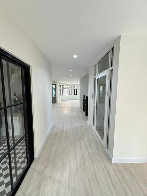 Spacious and modern corridor with natural light