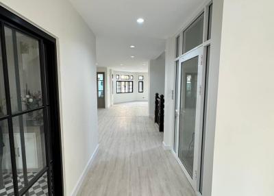 Spacious and modern corridor with natural light