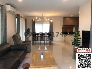 Spacious living room with open dining and kitchen area