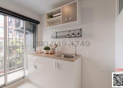 Bright modern kitchen with large window
