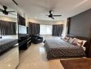 Spacious bedroom with modern furnishings and ample natural light