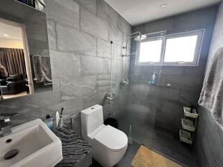 Spacious modern bathroom with natural light