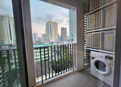 Balcony with a City View Including Appliances