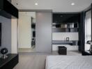 Modern bedroom with integrated living space, featuring sleek design and neutral tones