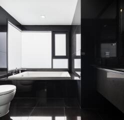 Modern bathroom with large bathtub and sleek design