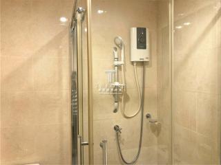 Modern bathroom interior with glass shower