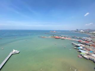 Panoramic aerial view of a coastal area with clear skies