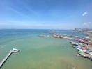 Panoramic aerial view of a coastal area with clear skies