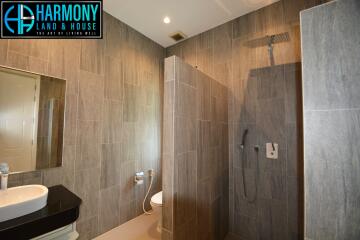 Modern bathroom with walk-in shower and luxurious finishes