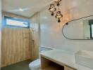 Modern bathroom interior with elegant lighting and wooden finishes