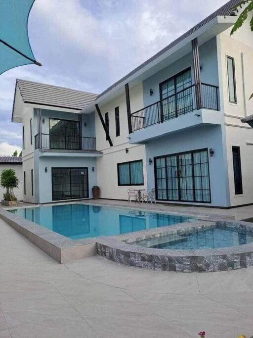 Modern two-story house with a swimming pool